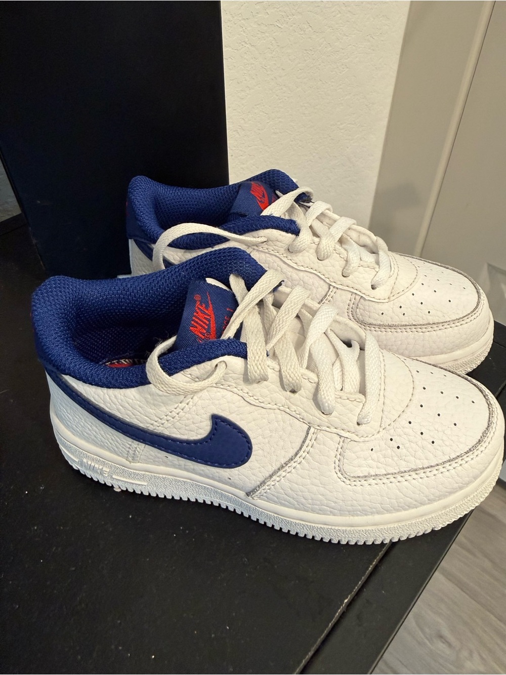 Nike White Leather Sneakers with Navy Blue Swoosh